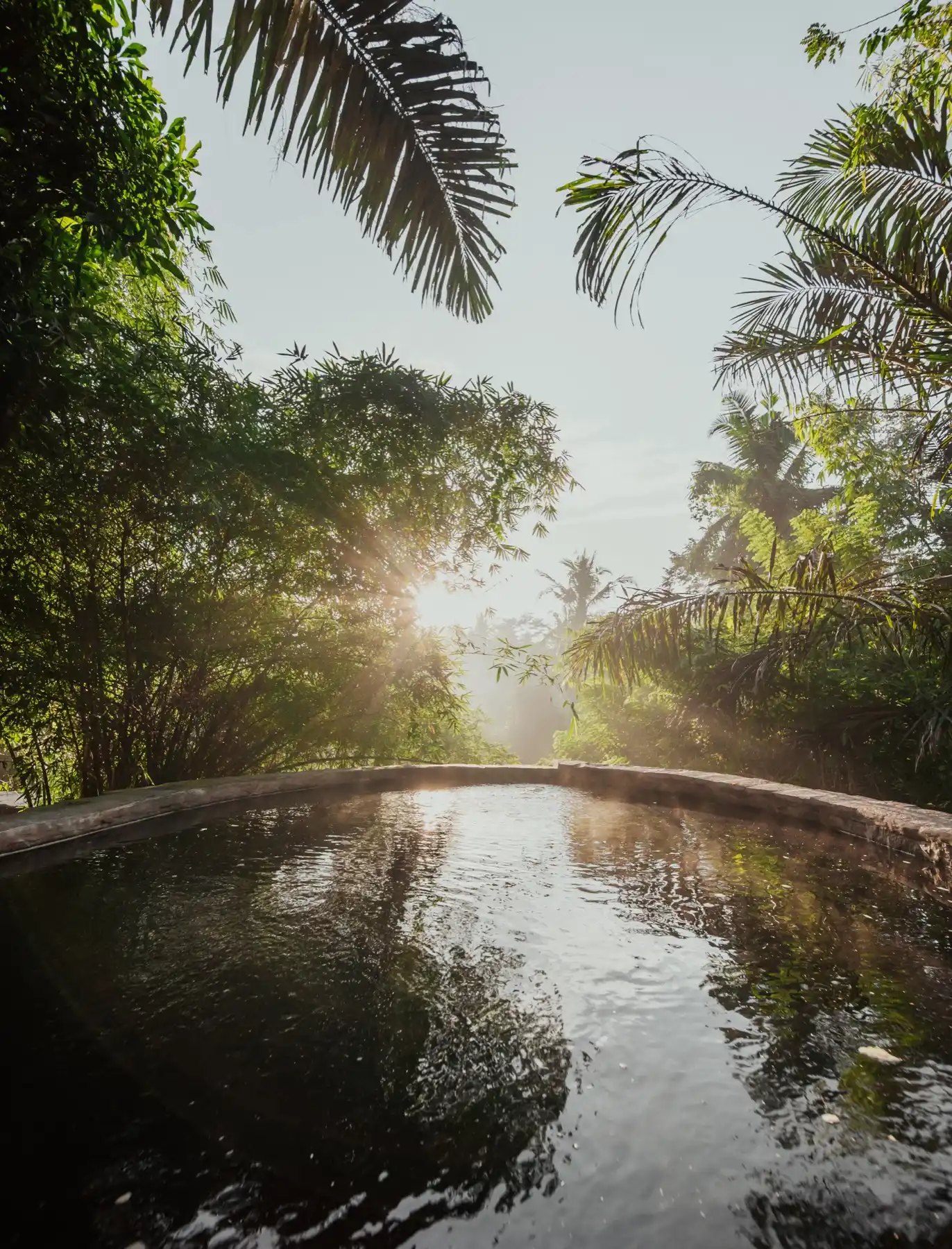 Natural stone pool at sunrise