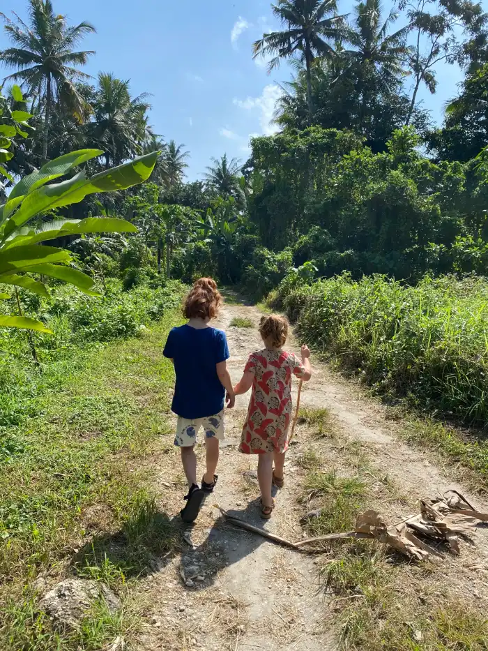 Children walking in Eco Village Sibang