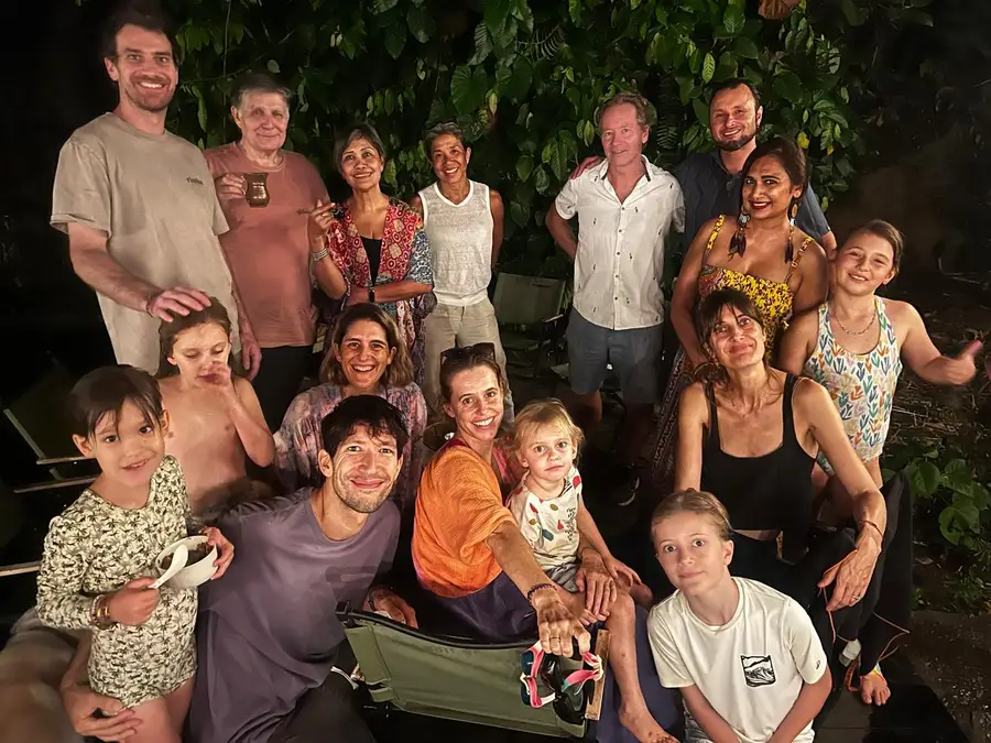 Group photo of the Eco Village Sibang community at night